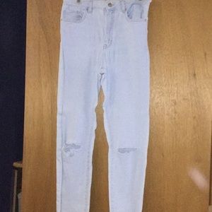 light blue ripped jeans